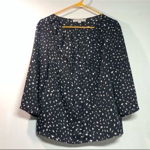 Black patterned ruffle blouse